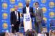 OAKLAND, CA - JULY 7: Head coach Steve Kerr of the Golden State Warriors, Kevin Durant and General Manager Bob Myers display the jersey of Kevin Durant #35 Golden State Warriors during the press conference to introduce Kevin Durant on July 7, 2016 in Oak