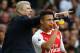 Arsenal's French manager Arsene Wenger (L) gestures alongside Arsenal's Chilean striker Alexis Sanchez during the English Premier League football match between Tottenham Hotspur and Arsenal at White Hart Lane in London, on April 30, 2017. / AFP PHOTO / I