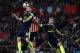 Arsenal's German defender Shkodran Mustafi (L) heads the ball under pressure from Southampton's Irish striker Shane Long as Arsenal's English defender Rob Holding (2nd R) looks on during the English Premier League football match between Southampton and Ar
