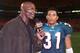 10 Dec 2001: Eric Dickerson of ABC's Monday Night Football interviews Brock Marion #31 of the Miami Dolphins after the game against the Indianapolis Colts at Pro Player Stadium in Miami, Florida. The Dolphins win 6 - 41. DIGITAL IMAGE Mandatory Credit:
