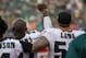 PHILADELPHIA, PA - AUGUST 17: Malcolm Jenkins #27 of the Philadelphia Eagles holds his fist in the air during the national anthem while Chris Long #56 of the Philadelphia Eagles puts his arm around him prior to the preseason game against the Buffalo Bills