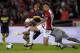 Boca Juniors' forward Dario Benedetto (back) vies for the ball with Estudiantes' goalkeeper Mariano Andujar (C) and defender Juan Foyth during their Argentina First Divsion football match at Ciudad de La Plata stadium in La Plata, Argentina on May 6, 2017