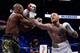 McGregor throws a grazing right hand at Mayweather.