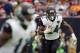 HOUSTON, TX - DECEMBER 18: T.J. Yeldon #24 of the Jacksonville Jaguars runs the ball against the Houston Texans in the third quarter at NRG Stadium on December 18, 2016 in Houston, Texas. (Photo by Tim Warner/Getty Images)