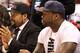Ice Cube and 50 Cent sit courtside.