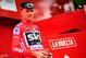 Sky's British cyclist Christopher Froome celebrates wearing the leader's red jersey on the podium after winning the 10th stage of the 72nd edition of 'La Vuelta' Tour of Spain cycling race, a 164,8 km route between Caravaca to Alhama de Murcia, on August
