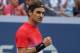 Roger Federer of Switzerland pumps his fist after making a shot agaist Mikhail Youzhny of Russia during their 2017 US Open Men's Singles match at the USTA Billie Jean King National Tennis Center in New York on August 31, 2017. / AFP PHOTO / DON EMMERT