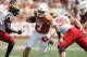 AUSTIN, TX - SEPTEMBER 02: Shane Buechele #7 of the Texas Longhorns scrambles and is tackled by Brett Kulka #96 of the Maryland Terrapins in the second quarter at Darrell K Royal-Texas Memorial Stadium on September 2, 2017 in Austin, Texas. (Photo by Ti