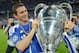 : Chelsea's British midfielder Frank Lampard holds the trophy after the UEFA Champions League final football match between FC Bayern Muenchen and Chelsea FC on May 19, 2012 at the Fussball Arena stadium in Munich. Chelsea won 4-3 in the penalty phase. AF