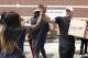 HOUSTON, TX - SEPTEMBER 3: (AFP OUT) Anna Ucheomumu high fives Houston Texans defensive end J.J. Watt after loading a car with relief supplies for people impacted by Hurricane Harvey on September 3, 2017, in Houston, Texas. J.J. Watt's Hurricane Harvey Re