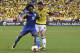 Brazil's Willian (L) vies for the ball with Colombia's James Rodriguez during their 2018 World Cup qualifier football match in Barranquilla, Colombia, on September 5, 2017. / AFP PHOTO / Luis Acosta (Photo credit should read LUIS ACOSTA/AFP/Getty I
