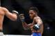 December 30, 2016; Las Vegas, NV, USA; Neil Magny moves in against Johny Hendricks during UFC 207 at T-Mobile Arena. Mandatory Credit: Mark J. Rebilas-USA TODAY Sports