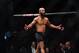 2Apr 15, 2017; Kansas City, MO, USA; Demetrious Johnson (red) celebrates following the win over and Wilson Reis (not pictured) during UFC Fight Night at Sprint Center. Mandatory Credit: Ron Chenoy-USA TODAY Sports