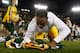 Packers safety Damarious Randall signing a jersey