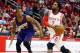 HOUSTON, TX - MARCH 21: Patrick Beverley #2 of the Houston Rockets takes the basketball up the court in front of Eric Bledsoe #2 of the Phoenix Suns during their game against the Phoenix Sunsat the Toyota Center on March 21, 2015 in Houston, Texas. NOTE
