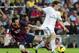 Real Madrid's Croatian midfielder Luka Modric (R) vies with Barcelona's Argentinian forward Lionel Messi during the Spanish league Clasico football match FC Barcelona vs Real Madrid CF at the Camp Nou stadium in Barcelona on October 26, 2013. AFP PHO