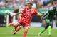 Bayern Munich's midfielder Thomas Mueller vies for the ball during the German first division Bundesliga football match Werder Bremen vs Bayern Munich in Bremen, nothern Germany, on August 26, 2017. / AFP PHOTO / PATRIK STOLLARZ / RESTRICTIONS: DURING MATC