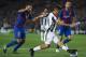 BARCELONA, SPAIN - APRIL 19: Jordi Alba (L) of Barcelona competes for the ball with Paulo Dybala of Juventus during the UEFA Champions League Quarter Final second leg match between FC Barcelona and Juventus at Camp Nou on April 19, 2017 in Barcelona, Spa