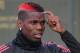 Manchester United's French midfielder Paul Pogba attends a team training session at the club's training complex near Carrington, west of Manchester in north west England on September 11, 2017, on the eve of their UEFA Champions League Group A football mat