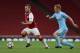 LONDON, ENGLAND - AUGUST 21: Jack Wilshere of Arsenal takes the ball past Matthew Smith of Manchester City during the Premier League 2 match between Arsenal v Manchester City at Emirates Stadium on August 21, 2017 in London, England. (Photo by James Chan