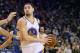 OAKLAND, CA - DECEMBER 30: Klay Thompson #11 of the Golden State Warriors in action against the Dallas Mavericks at ORACLE Arena on December 30, 2016 in Oakland, California. NOTE TO USER: User expressly acknowledges and agrees that, by downloading and or