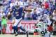 ORCHARD PARK, NY - SEPTEMBER 10: Tyrod Taylor #5 of the Buffalo Bills runs the ball as Kony Ealy #94 of the New York Jets attempts to tackle him during the first quarter on September 10, 2017 at New Era Field in Orchard Park, New York. (Photo by Brett C