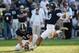 STATESBORO, GA - NOVEMBER 28: Punter Ryan Nowicki #49 of the Georgia Southern Eagles holds the ball for kicker Younghoe Koo #9 during a field goal attempt against the South Alabama Jaguars during the third quarter on November 28, 2015 at Paulson Stadium