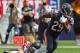 CHICAGO, IL - SEPTEMBER 10: Tarik Cohen #29 of the Chicago Bears eludes Brooks Reed #50 of the Atlanta Falcons during the season opening game at Soldier Field on September 10, 2017 in Chicago, Illinois. The Falcons defeated the Bears 23-17. (Photo by Jo