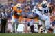 Sep 9, 2017; Knoxville, TN, USA; Tennessee Volunteers running back John Kelly (4) carries the ball past Indiana State Sycamores defensive tackle Norvell McGlaun (52) in the second half at Neyland Stadium. Tennessee defeated Indiana State 42-7. Mandatory C