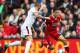 LIVERPOOL, ENGLAND - SEPTEMBER 16: Philippe Coutinho of Liverpool attempts to get past Steven Defour of Burnley during the Premier League match between Liverpool and Burnley at Anfield on September 16, 2017 in Liverpool, England. (Photo by Alex Livesey/
