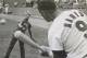 Roger Jr. playing a game of pepper with his father, Roger Maris.