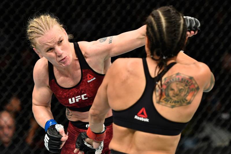 EDMONTON, AB - SEPTEMBER 09: (L-R) Valentina Shevchenko of Kyrgyzstan punches Amanda Nunes of Brazil in their women's bantamweight bout during the UFC 215 event inside the Rogers Place on September 9, 2017 in Edmonton, Alberta, Canada. (Photo by Jeff Bot