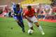 Monaco's Brazilian defender Jorge (R) vies with Strasbourg's French midfielder Jonas Martin during the French Ligue 1 football match ASM Monaco against Strasbourg on September 16, 2017 at the Louis II Stadium in Monaco. / AFP PHOTO / YANN COATSALIOU