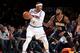 NEW YORK, NY - DECEMBER 20: Carmelo Anthony #7 of the New York Knicks handles the ball against Paul George #13 of the Indiana Pacers during a game on December 20, 2016 at Madison Square Garden in New York City, New York. NOTE TO USER: User expressly ackn