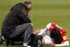 Falcao lies injured after a heavy challenge against the amateurs of Chasselay