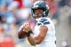 NASHVILLE, TN - SEPTEMBER 24: Quarterback Russell Wilson #3 of the Seattle Seahawks looks to make a pass against the Tennessee Titans at Nissan Stadium on September 24, 2017 in Nashville, Tennessee. (Photo by Wesley Hitt/Getty Images)