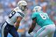 Sep 17, 2017; Carson, CA, USA; Los Angeles Chargers defensive end Joey Bosa (99) works against Miami Dolphins offensive guard Laremy Tunsil (67) during the first quarter at StubHub Center. Mandatory Credit: Jake Roth-USA TODAY Sports