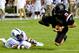 COLUMBIA, SC - SEPTEMBER 16: Quarterback Jake Bentley #19 of the South Carolina Gamecocks is tripped up by defensive lineman Denzil Ware #35 of the Kentucky Wildcats at Williams-Brice Stadium on September 16, 2017 in Columbia, South Carolina. (Photo by T