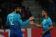 Arsenal's forward from France Olivier Giroud (L) celebrates with teammates after scoring a goal from the penalty spot during the UEFA Europa League Group H football match between FC BATE Borisov and Arsenal FC in Borisov, outside Minsk, on September 28, 2