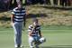 JERSEY CITY, NJ - SEPTEMBER 28: Patrick Reed and Jordan Spieth of the U.S. Team line up a putt during Thursday foursome matches of the Presidents Cup at Liberty National Golf Club on September 28, 2017 in Jersey City, New Jersey. (Photo by Sam Greenwood