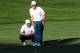 JERSEY CITY, NJ - SEPTEMBER 28: Branden Grace and Louis Oosthuizen of South Africa and the International Team line up a putt during Thursday foursome matches of the Presidents Cup at Liberty National Golf Club on September 28, 2017 in Jersey City, New Je