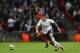 LONDON, ENGLAND - SEPTEMBER 16: Kyle Naughton of Swansea City challenges Kieran Trippier of Tottenham Hotspur during the Premier League match between Tottenham Hotspur and Swansea City at Wembley Stadium on September 16, 2017 in London, England. (Photo by