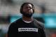 EAST RUTHERFORD, NJ - SEPTEMBER 24: Jordan Phillips #97 of the Miami Dolphins wears a t-shirt in support of former quarterback Colin Kaepernick before a game against of the New York Jets at MetLife Stadium on September 24, 2017 in East Rutherford, New Jer