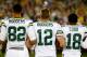 GREEN BAY, WI - SEPTEMBER 28: Richard Rodgers #82, Aaron Rodgers #12 , and Randall Cobb #18 of the Green Bay Packers link arms during the singing of the national anthem before the game against the Chicago Bears at Lambeau Field on September 28, 2017 in G