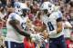 HOUSTON, TX - OCTOBER 01: Marcus Mariota #8 of the Tennessee Titans celebrates with Quinton Spain #67 after a touchdown in the second quarter against the Houston Texans at NRG Stadium on October 1, 2017 in Houston, Texas. (Photo by Tim Warner/Getty Imag