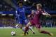 Chelsea's Brazilian midfielder Willian (L) vies with Manchester City's Belgian midfielder Kevin De Bruyne (R) during the English Premier League football match between Chelsea and Manchester City at Stamford Bridge in London on September 30, 2017. / AFP PH