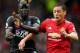 MANCHESTER, ENGLAND - SEPTEMBER 30: Nemanja Matic of Manchester United and Mamadou Sakho of Crystal Palace compete for the ball during the Premier League match between Manchester United and Crystal Palace at Old Trafford on September 30, 2017 in Manches