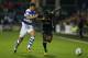 LONDON, ENGLAND - SEPTEMBER 29: Pawel Wszolek of Queens Park Rangers and Ryan Sessegnon of Fulham battle for possession during the Sky Bet Championship match between Queens Park Rangers and Fulham at Loftus Road on September 29, 2017 in London, England.