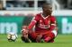 NEWCASTLE UPON TYNE, ENGLAND - OCTOBER 01: Daniel Sturridge of Liverpool reacts to a challenge during the Premier League match between Newcastle United and Liverpool at St. James' Park on October 1, 2017 in Newcastle upon Tyne, England. (Photo by Matthe