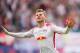 Leipzig´s forward Timo Werner celebrates scoring during the German dirst division Bundesliga football match between RB Leipzig and Eintracht Frankfurt in Leipzig, eastern Germany, on September 23, 2017. / AFP PHOTO / ROBERT MICHAEL / RESTRICTIONS: DURING